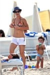 Jillian Michaels with son Phoenix at the beach in Miami
