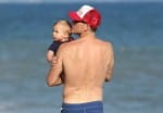 Reese Witherspoon's Husband Jim Toth Cradles Son Tennessee While Walking on The Beach