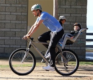 Josh Duhamel enjoys a bike ride with son AXL in Los Angeles
