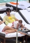 Kardashian with daughter Penelope pool side in Miami