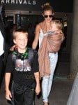 Kate Hudson And Family Arriving On A Flight At LAX