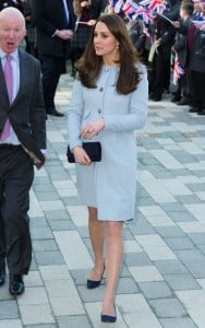 A pregnant Catherine, The Duchess of Cambridge greets students as she officially opens the Kensington Aldridge Academy in London