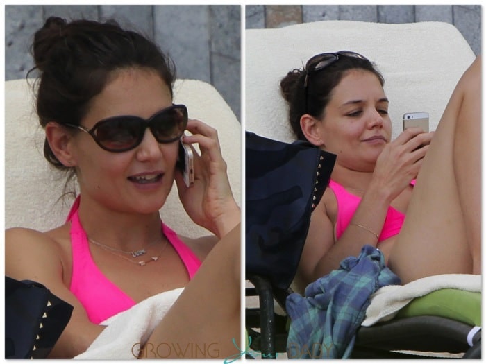 Katie Holmes Chats:Texts poolside in Miami