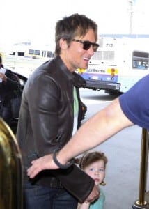 Keith Urban at the airport with his daughter Faith