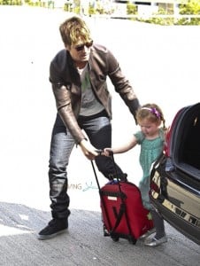 Keith Urban at the airport with his daughter Faith