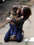 Keri Russell cuddles her daughter Willa Dreary on the set of the Americans