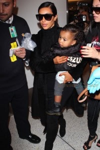 Kim Kardashian arrives at LAX with North West