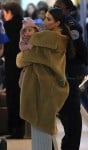 Kim Kardashian with baby North at JFK airport