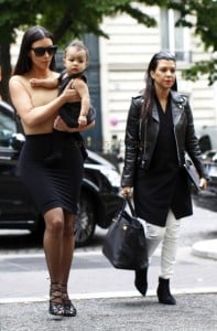 Kim Kardashian with daughter North West and sister Kourtney in Paris
