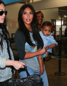 Kim Kardashian with daughter North West at Burbank airport