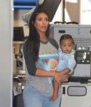 Kim Kardashian with daughter North West go through security at Burbank airport