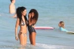 Kimora Lee Simmons plays in the ocean in St