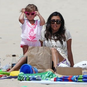 Kourtney Kardashian at the beach with daughter Penelope