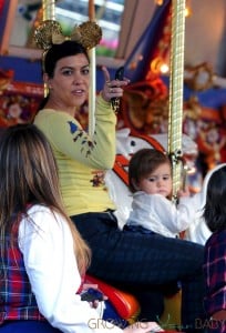 Kourtney Kardashian with daughter Penelope at Disneyland