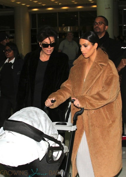 Kris Jenner and Kim Kardashian with baby North at JFK airport