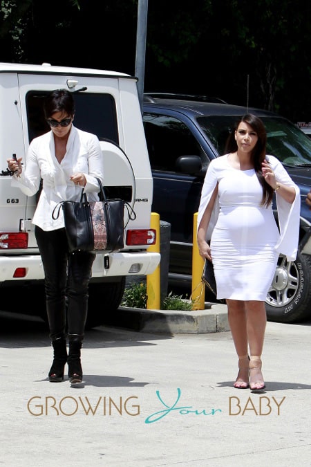 Kim Kardashian squeezes her pregnancy curves into a tight white dress as she joins 'momager' Kris Jenner for a trip to the Beauty Center in Los Angeles