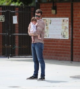 Kyle Newman and with son James at the park