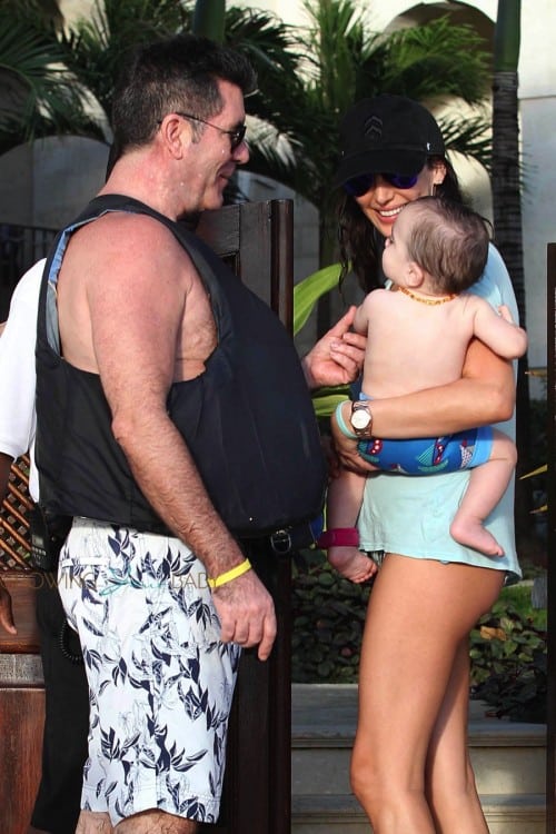 Lauren Silverman and Simon Cowell on the beach in Barbados with son Eric