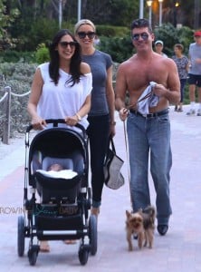 Lauren Silverman and Simon Cowell stroll with their son Eric