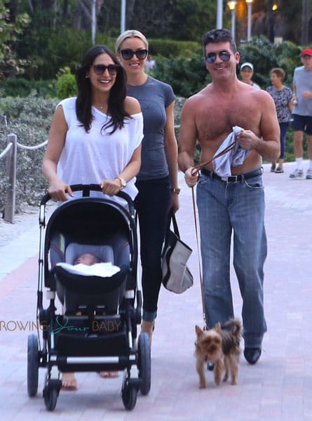 Lauren Silverman and Simon Cowell stroll with their son Eric