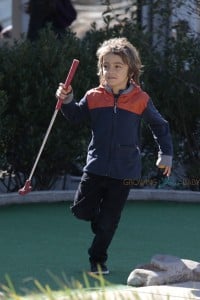 Camila Alves brings kids Levi, Vida and Livingston McConaughey to the mini-golf playground in Tribeca, NYC