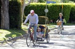 Liev Schreiber and Naomi Watts bike riding with sons Sasha and Sammy