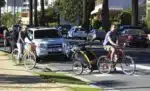 Liev Schreiber and Naomi Watts bike to the beach with their boys