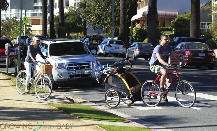 Liev Schreiber and Naomi Watts bike to the beach with their boys
