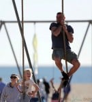 Liev Schreiber climbs the rope a the park with his son Sasha