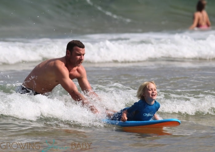 Liev Schreiber teaches his son Sasha how to surf in Australia
