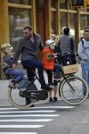 Liev Schreiber with sons Sasha and Sammy biking in NYC