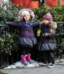 Loretta and Tabitha Broderick walking home from school