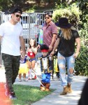 Mike Comrie and Hilary Duff with son Luca Comrie, who dressed up as a pirate for Church Halloween event