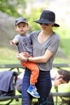 Miranda Kerr carries a very happy looking Flynn Bloom as they head home after a stroll through Central Park in New York