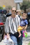 Molly Sims enjoys some park play time with her son Brooks in Los Angeles