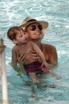Molly Sims and son Brooks Stuber in the pool in Miami