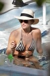 Molly Sims in the pool in Miami