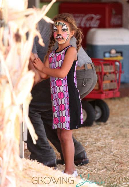 Nahla Aubry with her face painted at Mr. Bones Pumpkin Patch