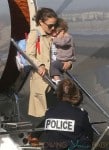 Natalie Portman arrives at Le Bourget airport in Paris with her son Aleph Millepied