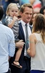 Adorable dad, Neil Patrick Harris, watches Harper Grace pull faces and even pulls a funny face back at Gideon Scott! LA