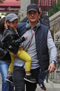 Orlando Bloom takes his son Flynn for a walk