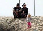 Pink, Carey Hart and their daughter Willow on the beach in LA