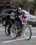 Pink, Carey Hart and their daughter Willow riding bikes in LA