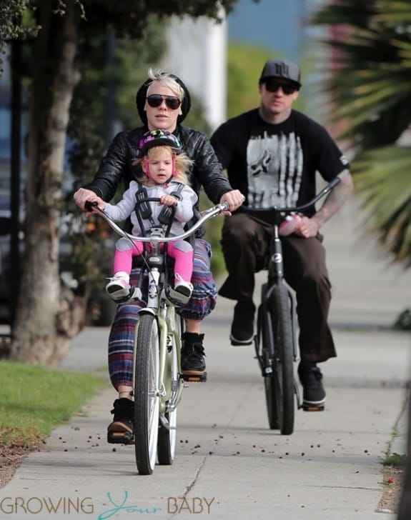 Pink, Carey Hart and their daughter Willow riding bikes in LA