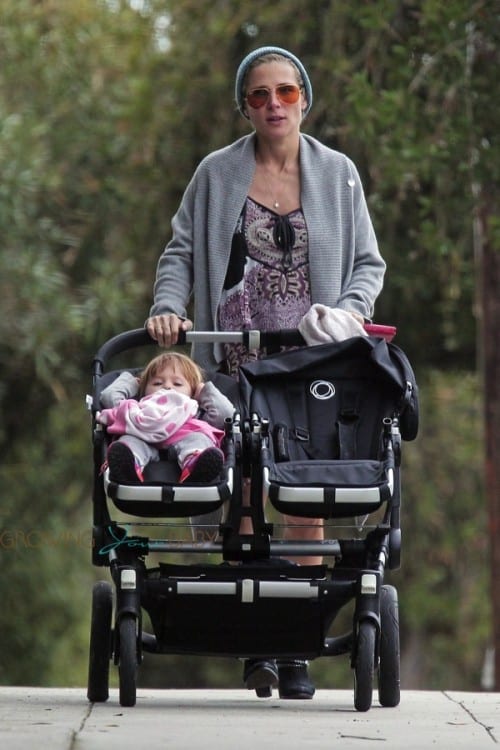 Pregnant Elsa Pataky pushes daughter India Hemsworth in LA