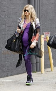 A pregnant Fergie going to a music studio in Santa Monica