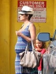 Halle Berry Shows Off Her Baby Bump In a Tight Maxi Dress While Out With Daughter Nahla