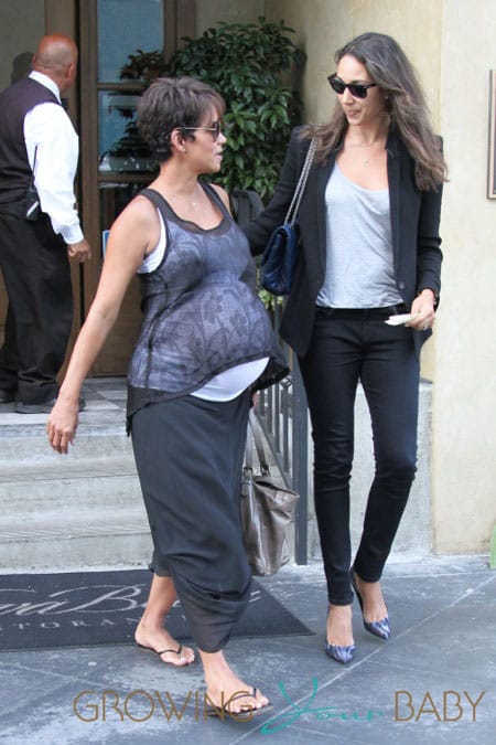 Halle Berry shows her baby bump as she heads to grab some lunch with a female companion in Los Angeles