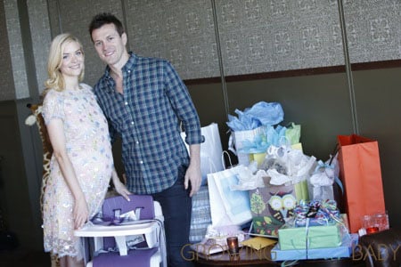 Pregnant Jaime King glowed as she showed off her favorite new baby gifts, including the Nuna ZAAZ highchair, during her baby shower on August 17, 2013