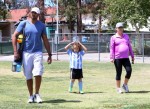 Pregnant Kendra Wilkinson and her husband Hank Baskett at their son's soccer game